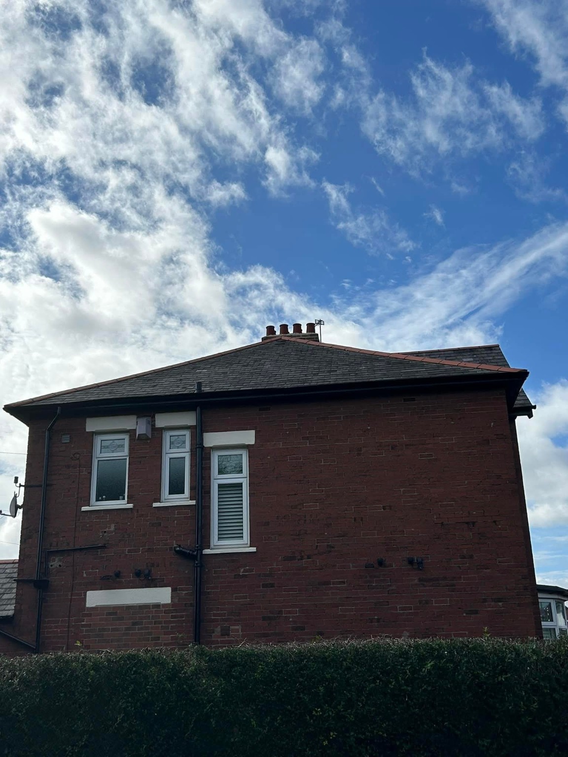 Slate roof on brick house
